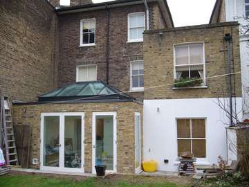 Sefton Park Liverpool. Design and build Orangery. Hwl Ornate Aluminium Lantern light double glazed with Pilkington Actic double glazed units. Firestone roof covering.Red Grandis Timber doors and windows. Pre painted with Sikkins micro- porous paint 